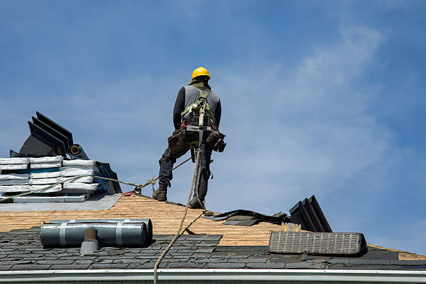 Professional Storm Damage Roof Repair technician working in Glade Valley, NC
